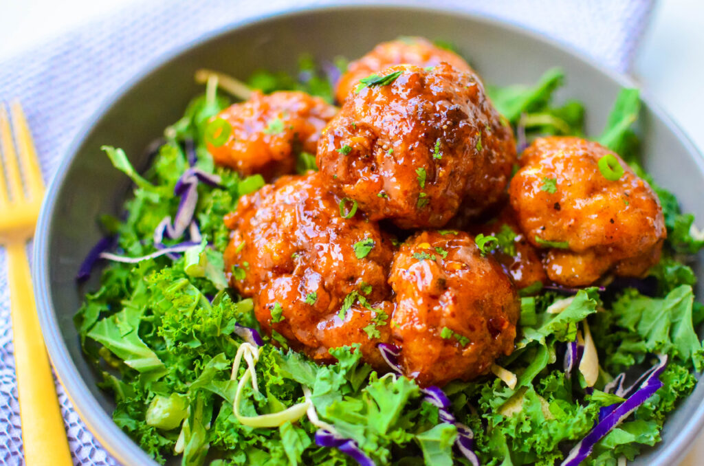 close up angle of the lemon pepper spicy honey cauliflower wings